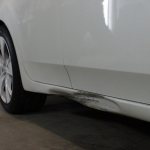 how to fix a dent on a car door sill